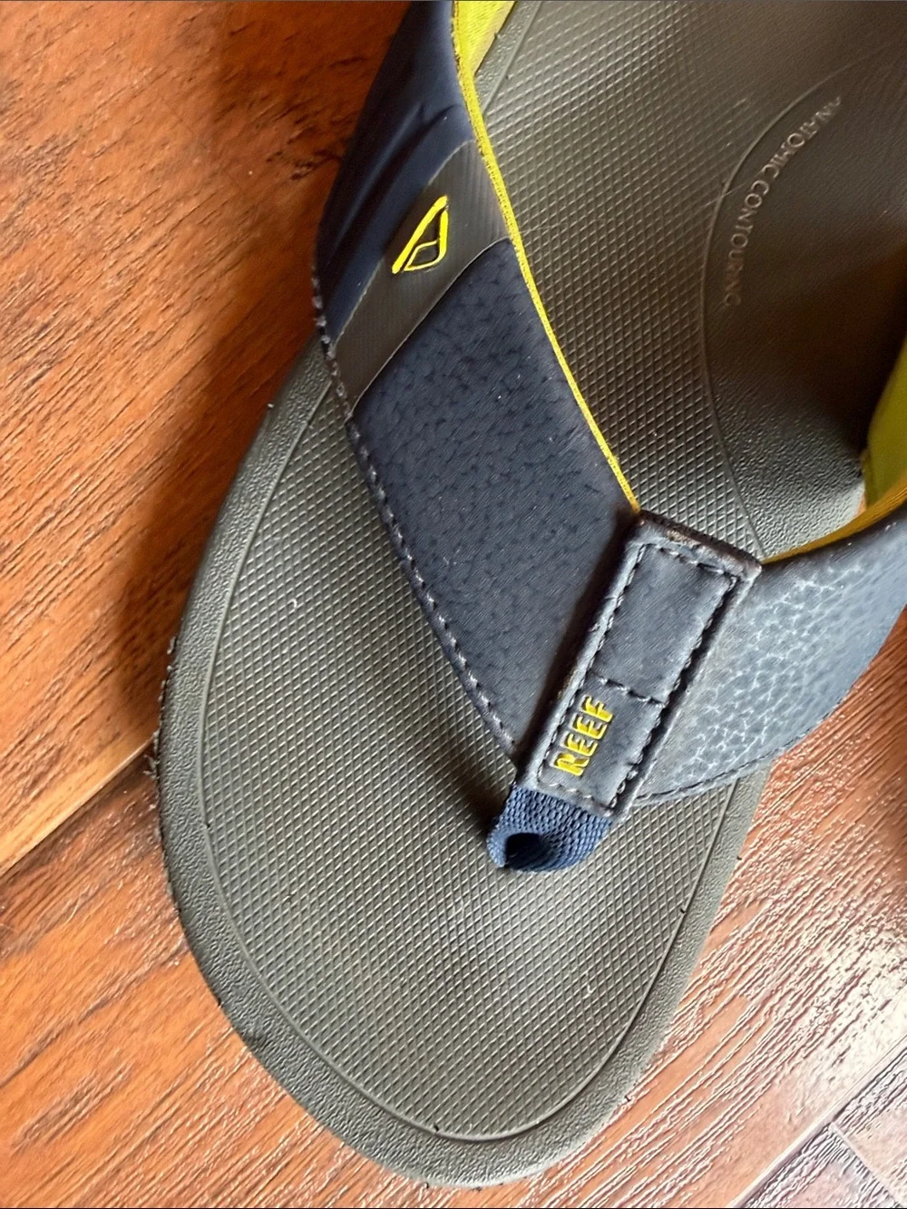 Reef Men’s Navy Flip Flops with Yellow Trim